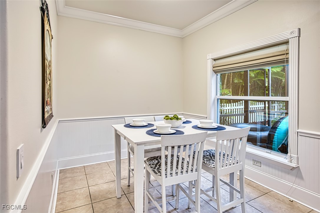 8916 Fawn Ridge Drive Fort Myers, FL 33912 - Photo 13 of 49 a view of a dining room with furniture window and outside view