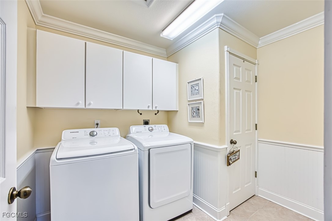8916 Fawn Ridge Drive Fort Myers, FL 33912 - Photo 38 of 49 a utility room with dryer and washer