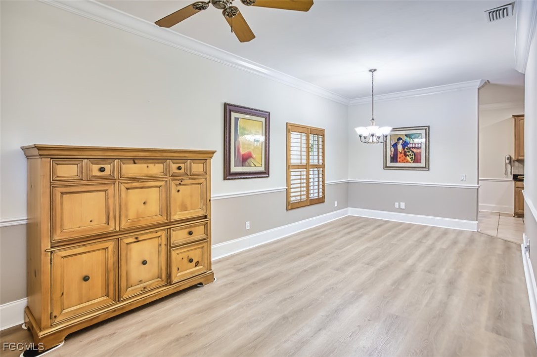 8916 Fawn Ridge Drive Fort Myers, FL 33912 - Photo 9 of 49 a view of an empty room with window and cabinet