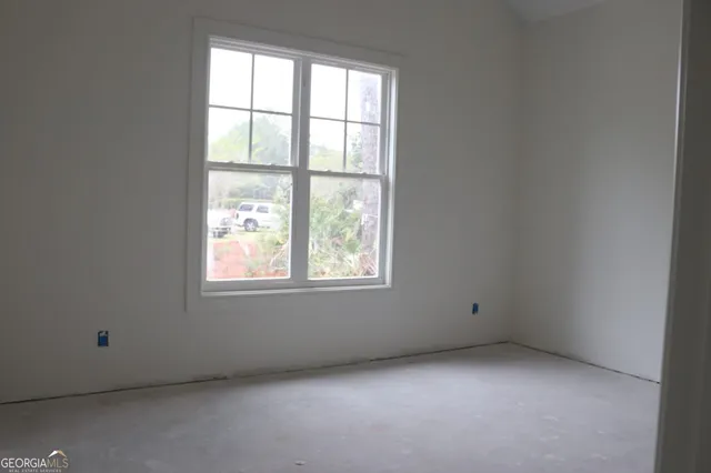 an empty room with a window