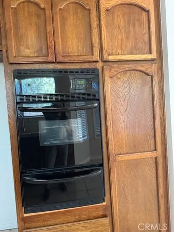 a close view of a stove and microwave