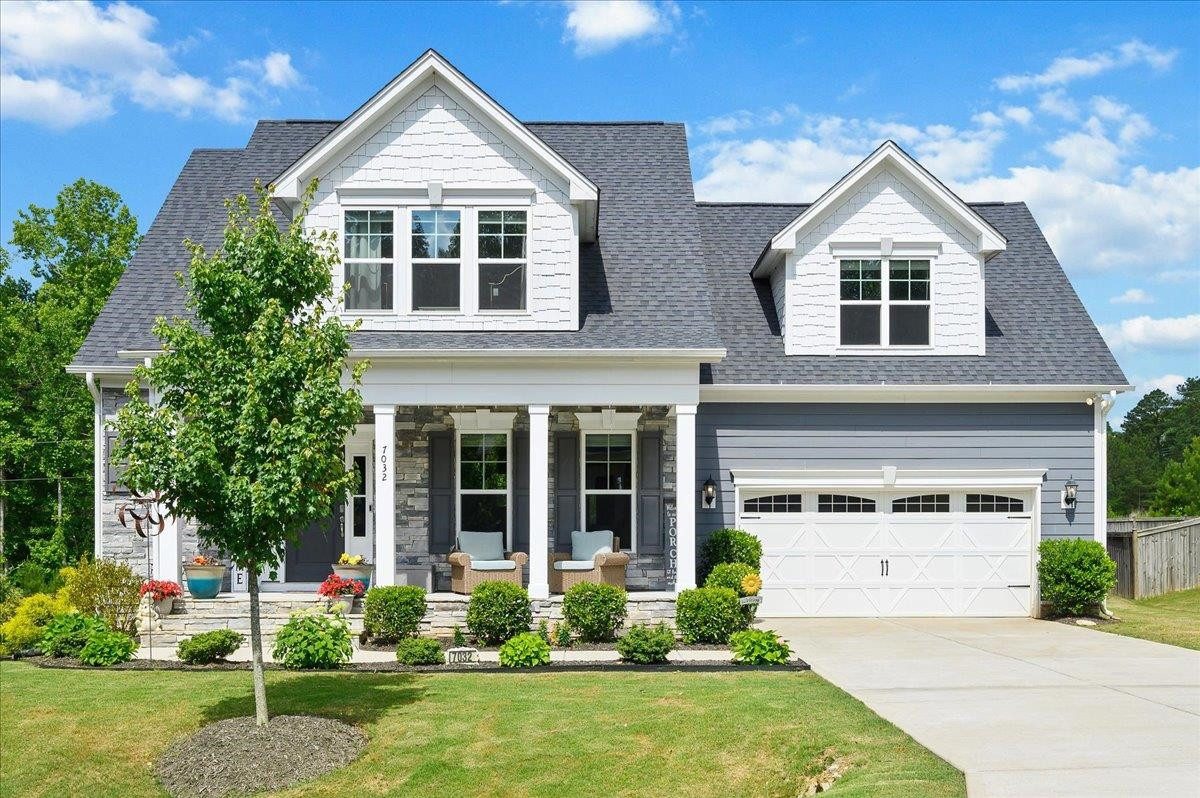 7032 Rex Road Holly Springs, NC 27540 - Photo 1 of 38 Gorgeous home with front porch sitting
