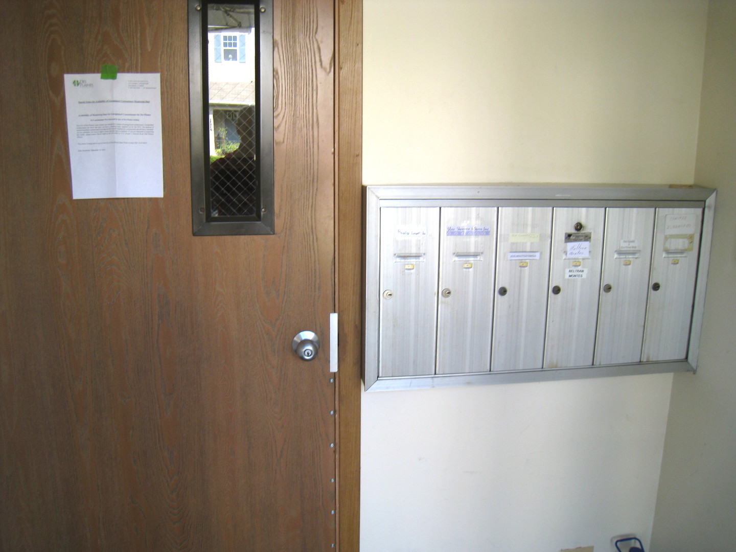 1235 Harding Avenue, Unit 302 Des Plaines, IL 60016 - Photo 20 of 22 a view of a hallway with wooden floor and closet