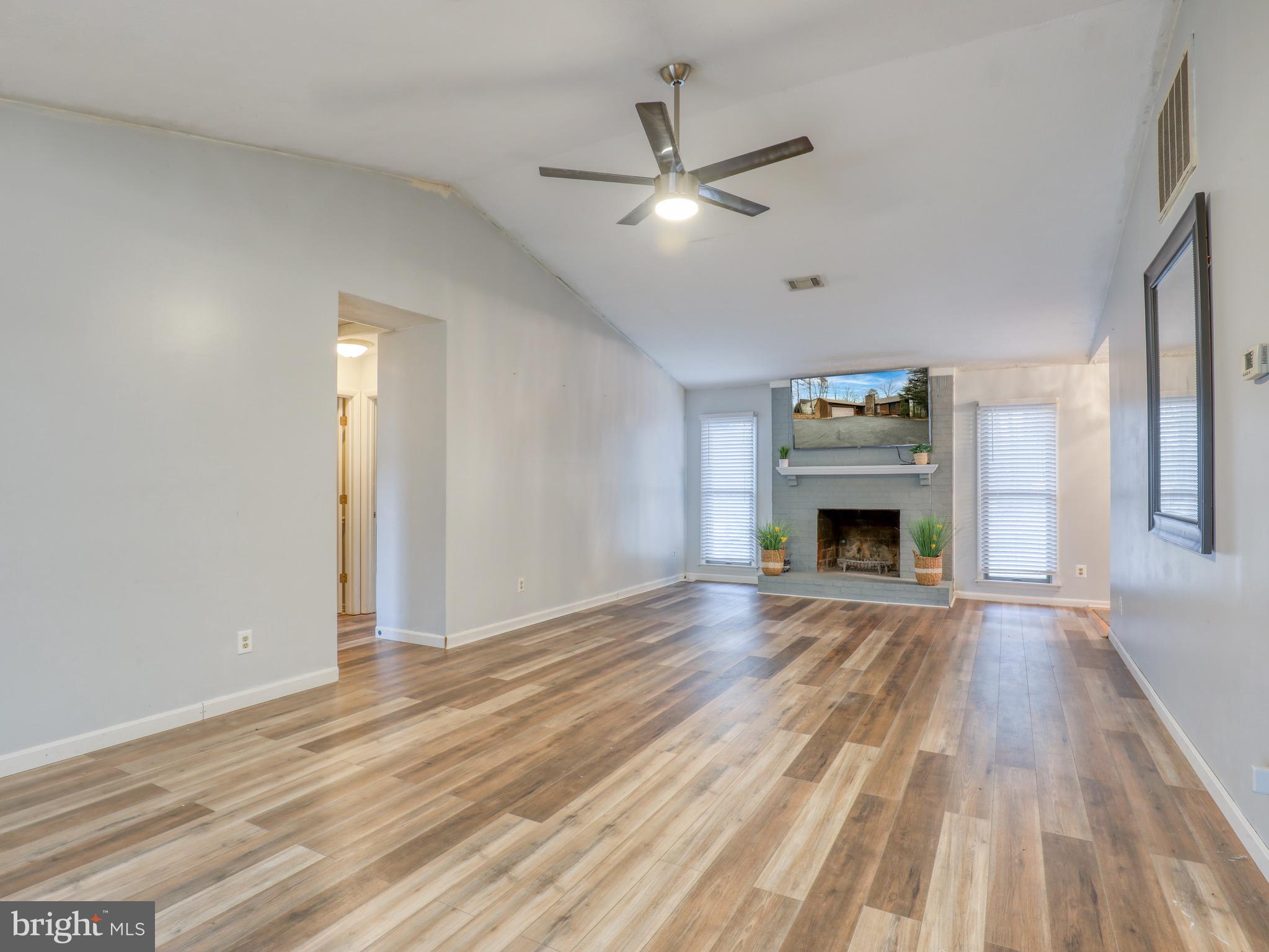 137 Holiday Road Cross Junction, VA 22625 - Photo 6 of 42 Cozy brick fireplace