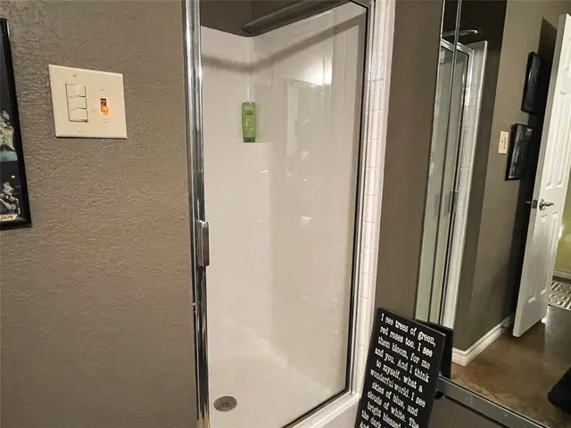 a view of a house with swimming pool and a yard