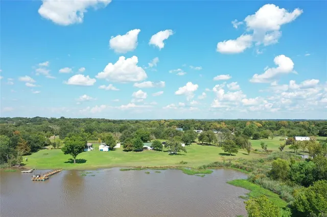 a view of a lake with a houses
