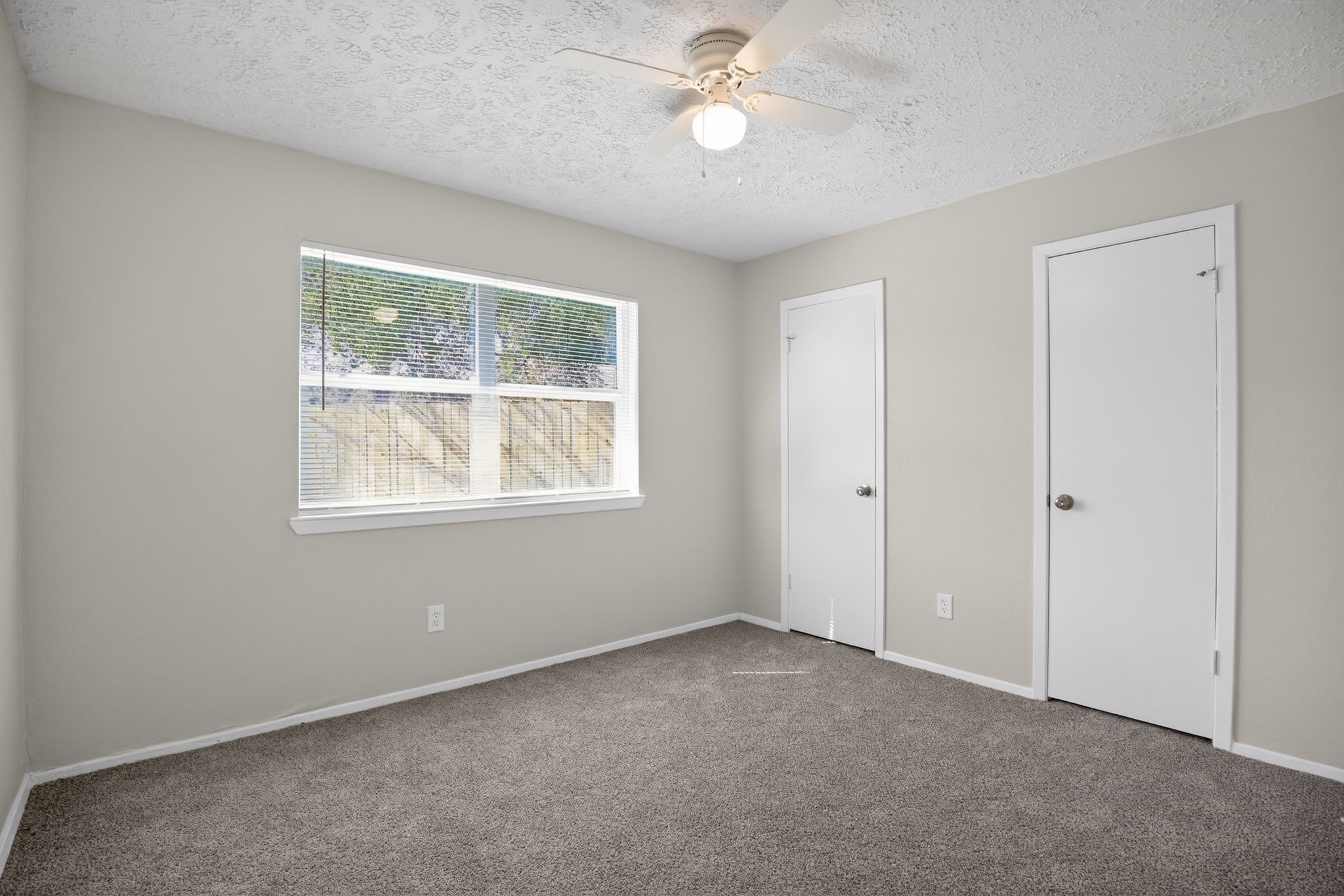 7311 Postwick Court Houston, TX 77095 - Photo 22 of 36 a view of an empty room with a window