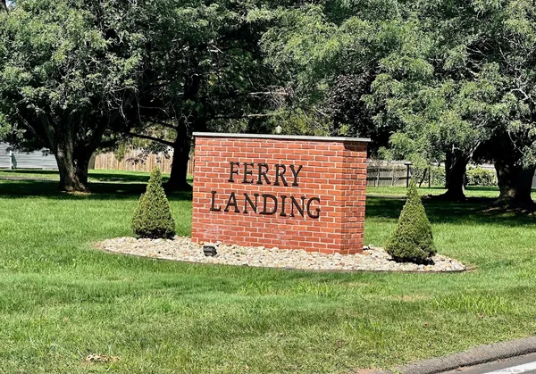 a sign on the side of the road