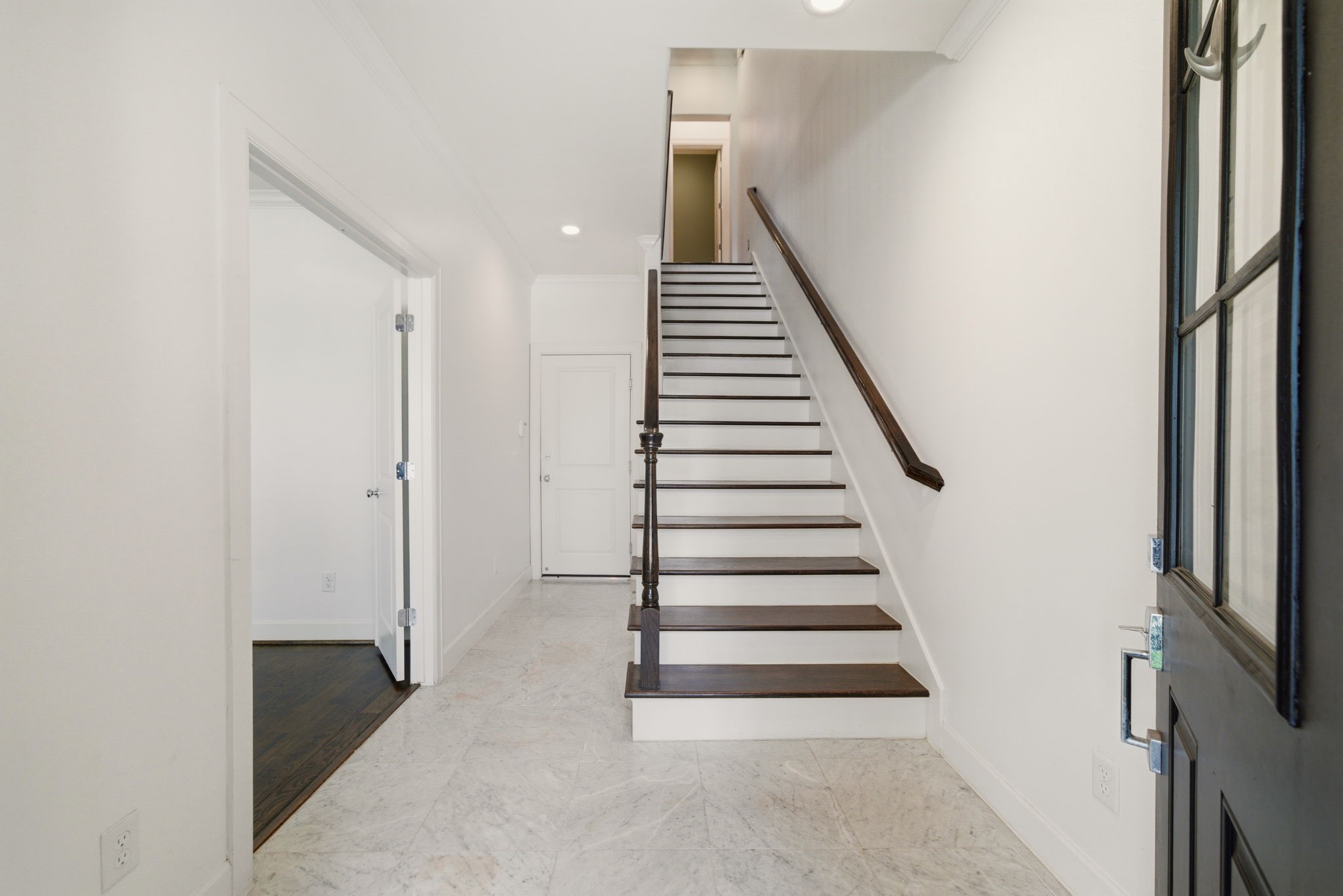 911 West Drew Street Houston, TX 77006 - Photo 7 of 44 a view of entryway with wooden floor