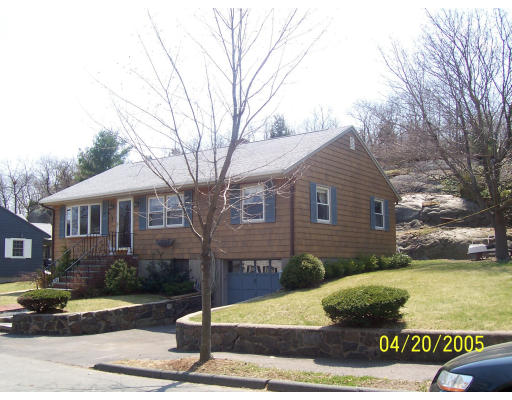 85 Moffatt Road Salem, MA 01970 - Photo 1 of 1 a front view of a house with garden