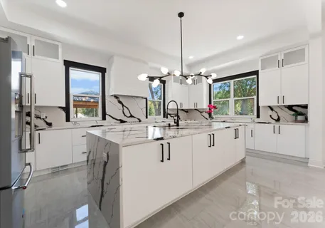 a view of a kitchen counter top space and sink