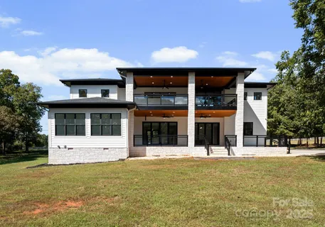 front view of a building with a yard
