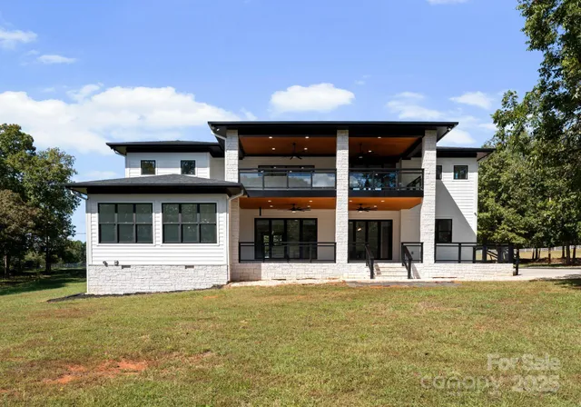 front view of a building with a yard
