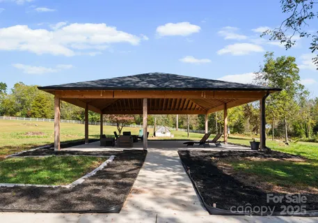 a view of a swimming pool with a patio