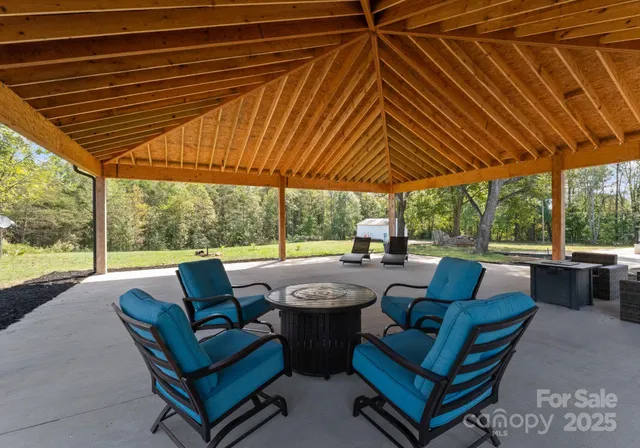 a view of patio with outdoor seating