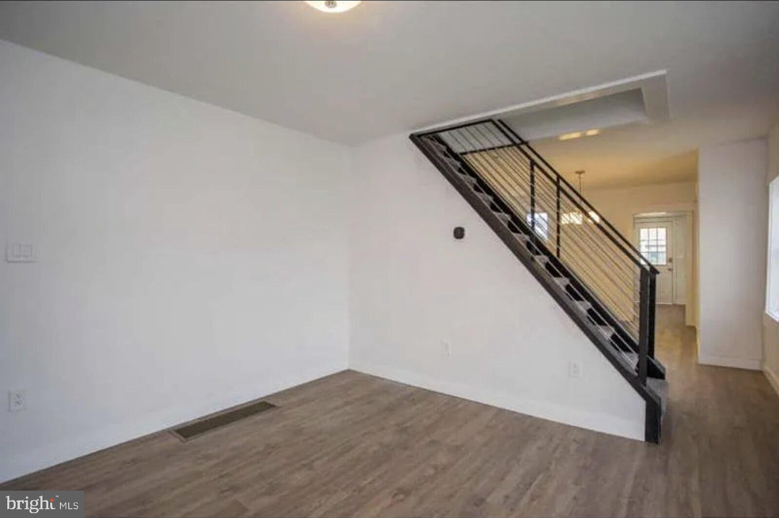 5 Coates Street Bridgeport, PA 19405 - Photo 12 of 28 a view of a hallway with wooden floor