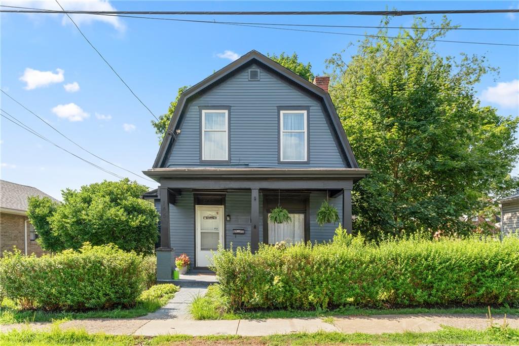 145 Georgetown Avenue Pittsburgh, PA 15229 - Photo 1 of 22 a front view of a house with garden