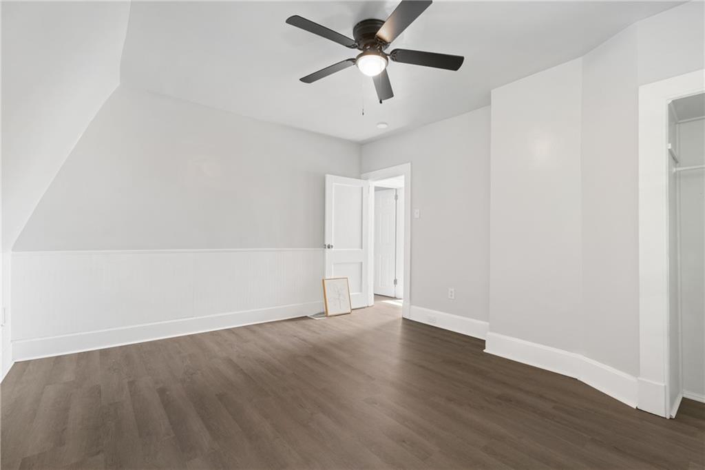 145 Georgetown Avenue Pittsburgh, PA 15229 - Photo 17 of 22 a view of an empty room with wooden floor