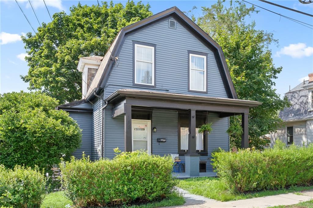 145 Georgetown Avenue Pittsburgh, PA 15229 - Photo 2 of 22 a front view of a house with garden