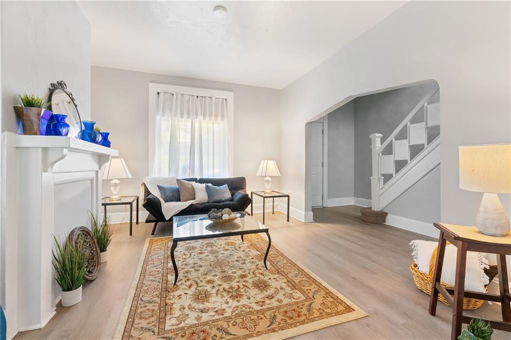 145 Georgetown Avenue Pittsburgh, PA 15229 - Photo 6 of 22 a living room with furniture and a rug