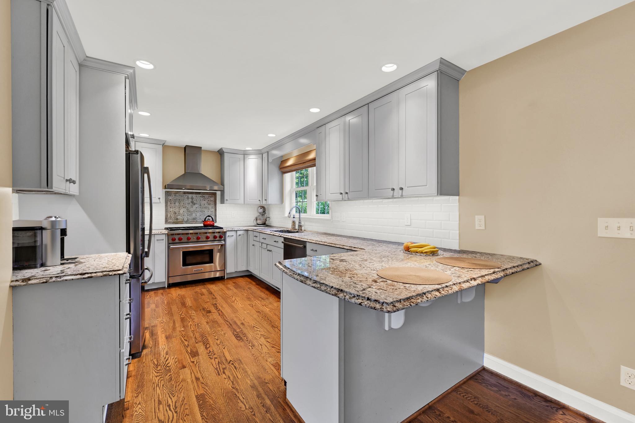 1840 Locust Ridge Road Lutherville-Timonium, MD 21093 - Photo 10 of 39 Granite counters and breakfast bar