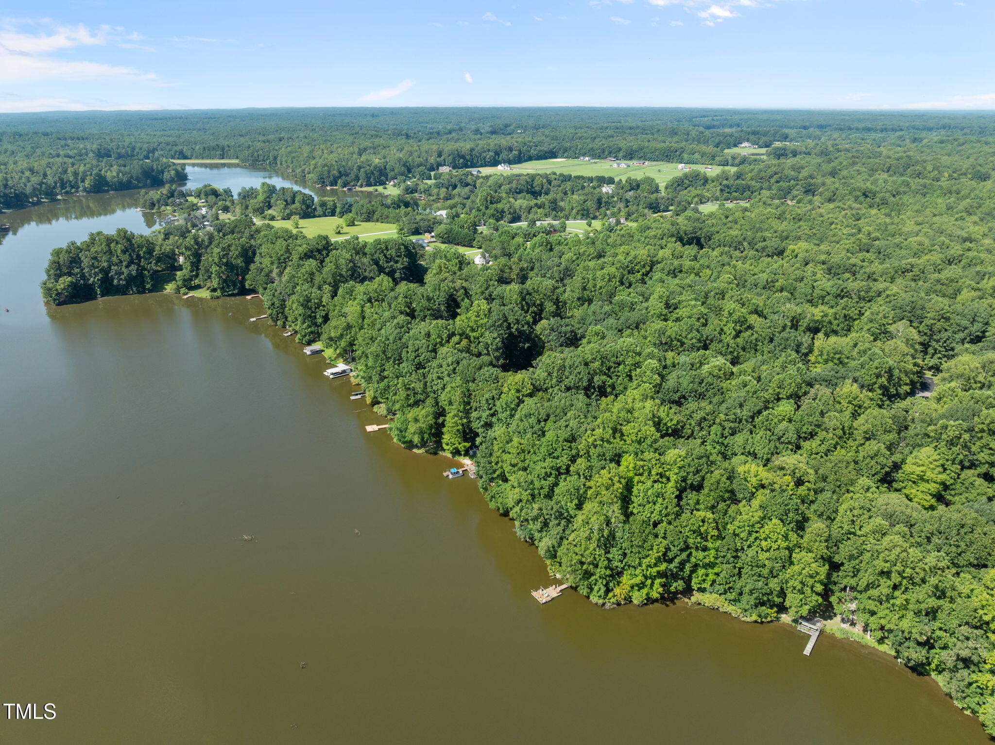 605 Canotage Court Cedar Grove, NC 27231 - Photo 5 of 17 an aerial view of residential houses with outdoor space and river