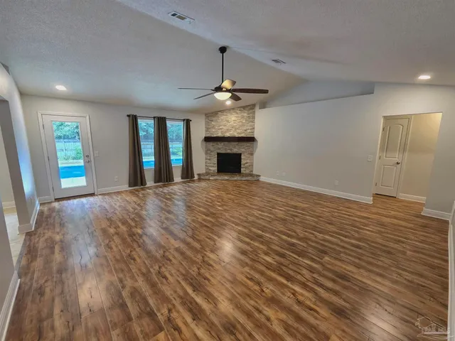 a view of a swimming pool with a patio