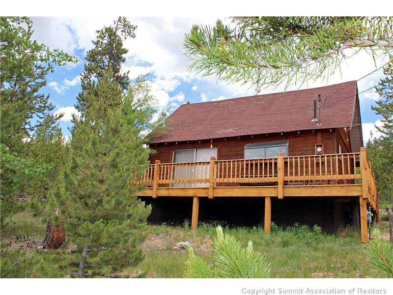 123 J Road Silverthorne, CO 80498 - Photo 15 of 17 a view of backyard with deck and a garden