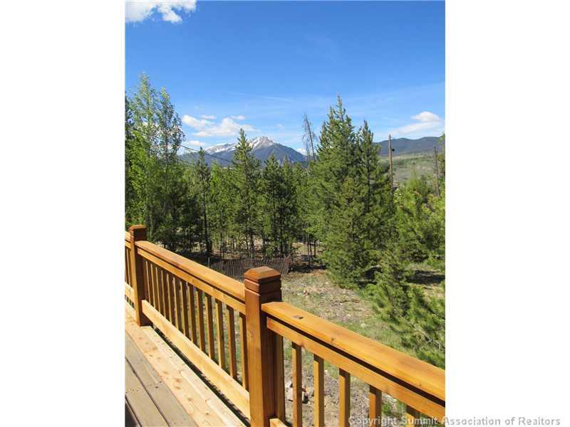 123 J Road Silverthorne, CO 80498 - Photo 17 of 17 a view of a balcony with wooden fence and floor