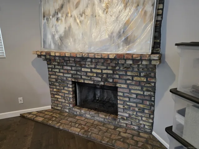 a kitchen with cabinets appliances a sink and a window
