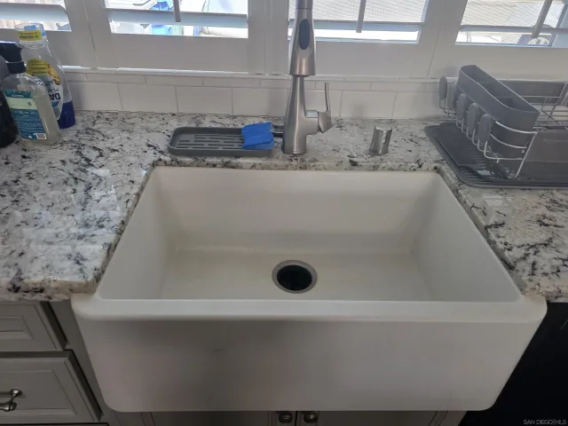 a bathroom with a bathtub and toilet