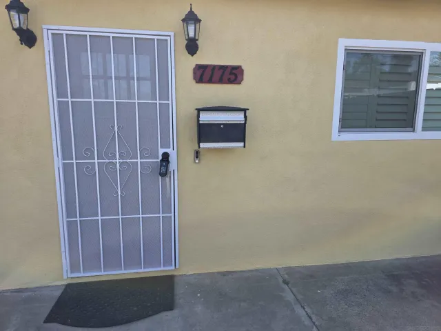 an aerial view of multiple houses with yard