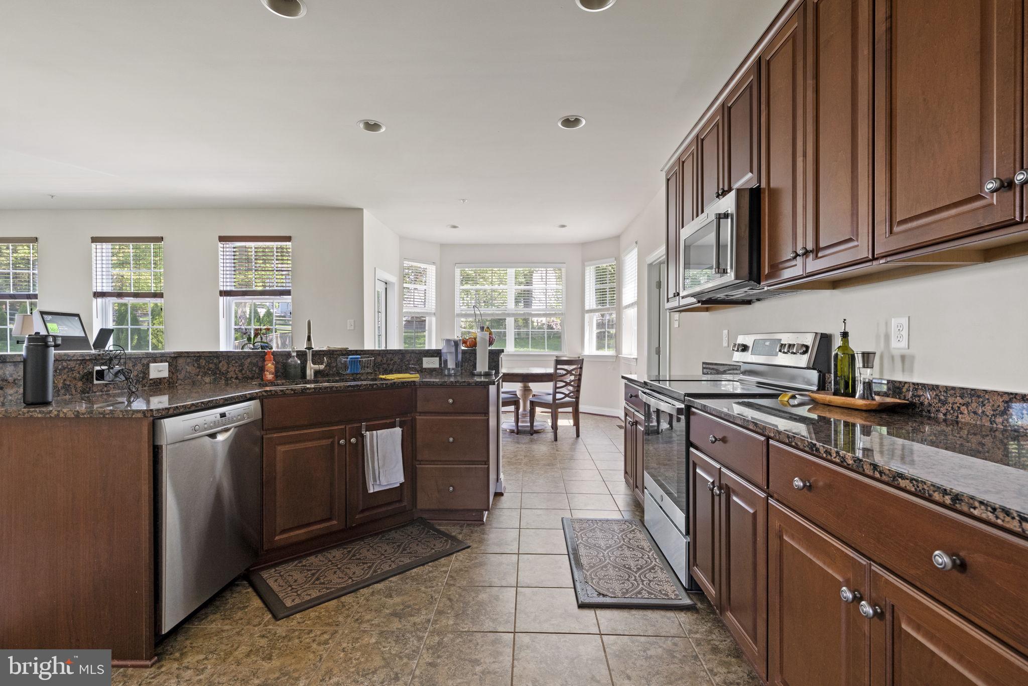 10490 Stansfield Road Laurel, MD 20723 - Photo 3 of 36 Open Kitchen w/granite counter tops!