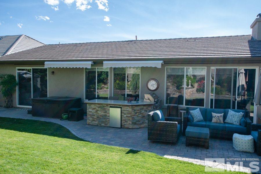 14070 Tagor Drive Reno, NV 89521 - Photo 23 of 24 a living room with furniture and a yard