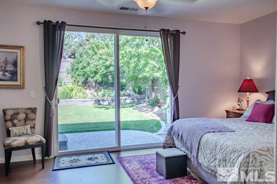 14070 Tagor Drive Reno, NV 89521 - Photo 10 of 24 a bedroom with a bed and a window