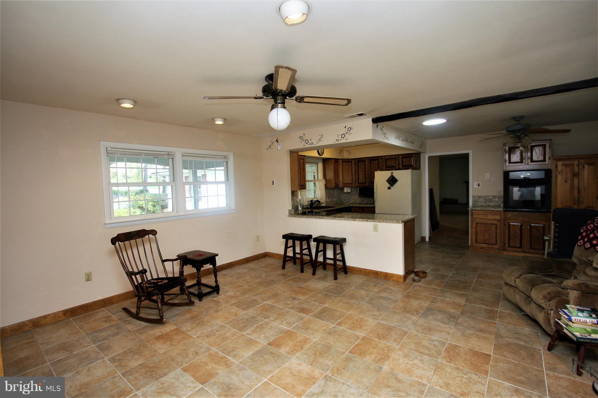 5001 West Running Brook Road Columbia, MD 21044 - Photo 2 of 26 Family Room Open to Kitchen