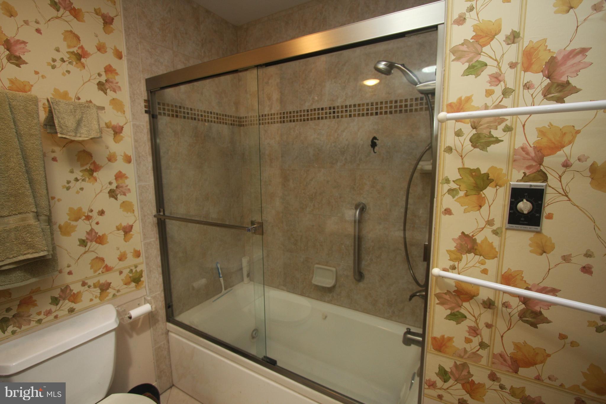 5001 West Running Brook Road Columbia, MD 21044 - Photo 20 of 26 Tile Floor and Tile Tub Surround