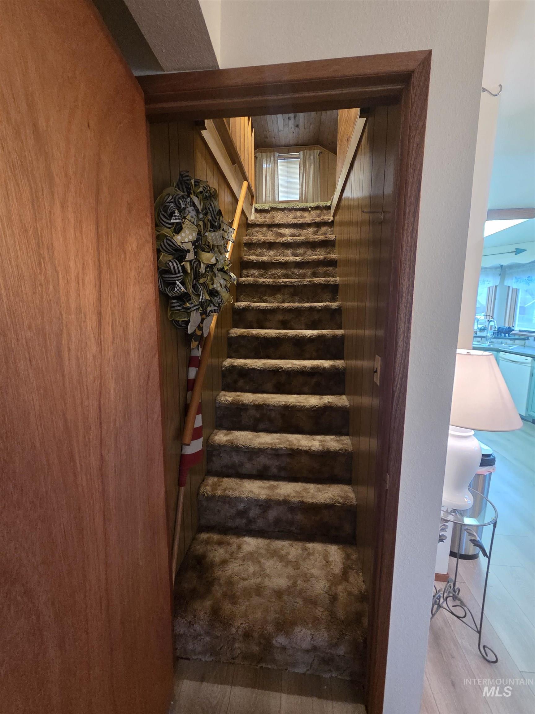1607 Main Street Pomeroy, WA 99347 - Photo 10 of 28 Stairway with wood finished floors