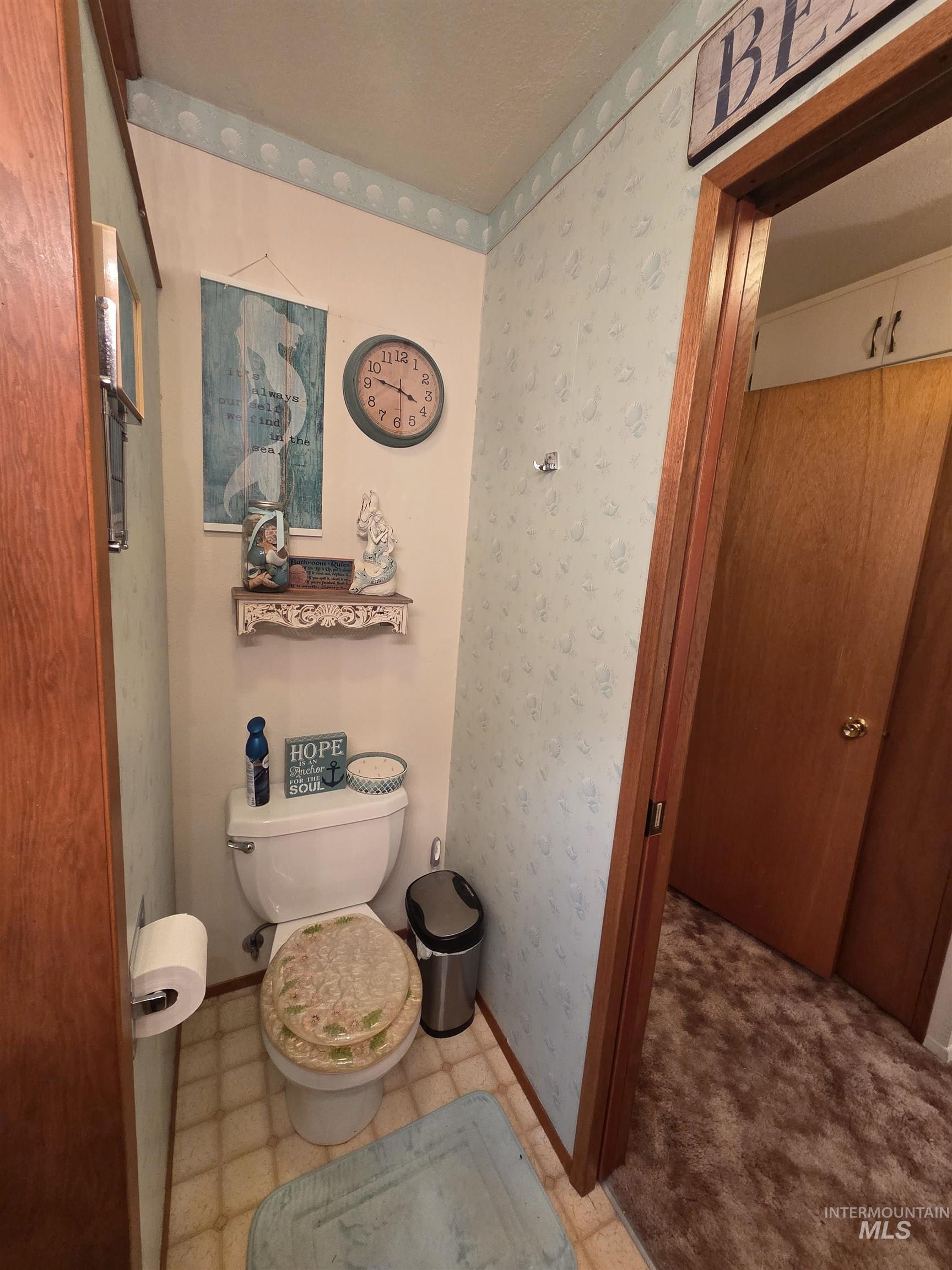 1607 Main Street Pomeroy, WA 99347 - Photo 19 of 28 Bathroom featuring wallpapered walls and light flooring
