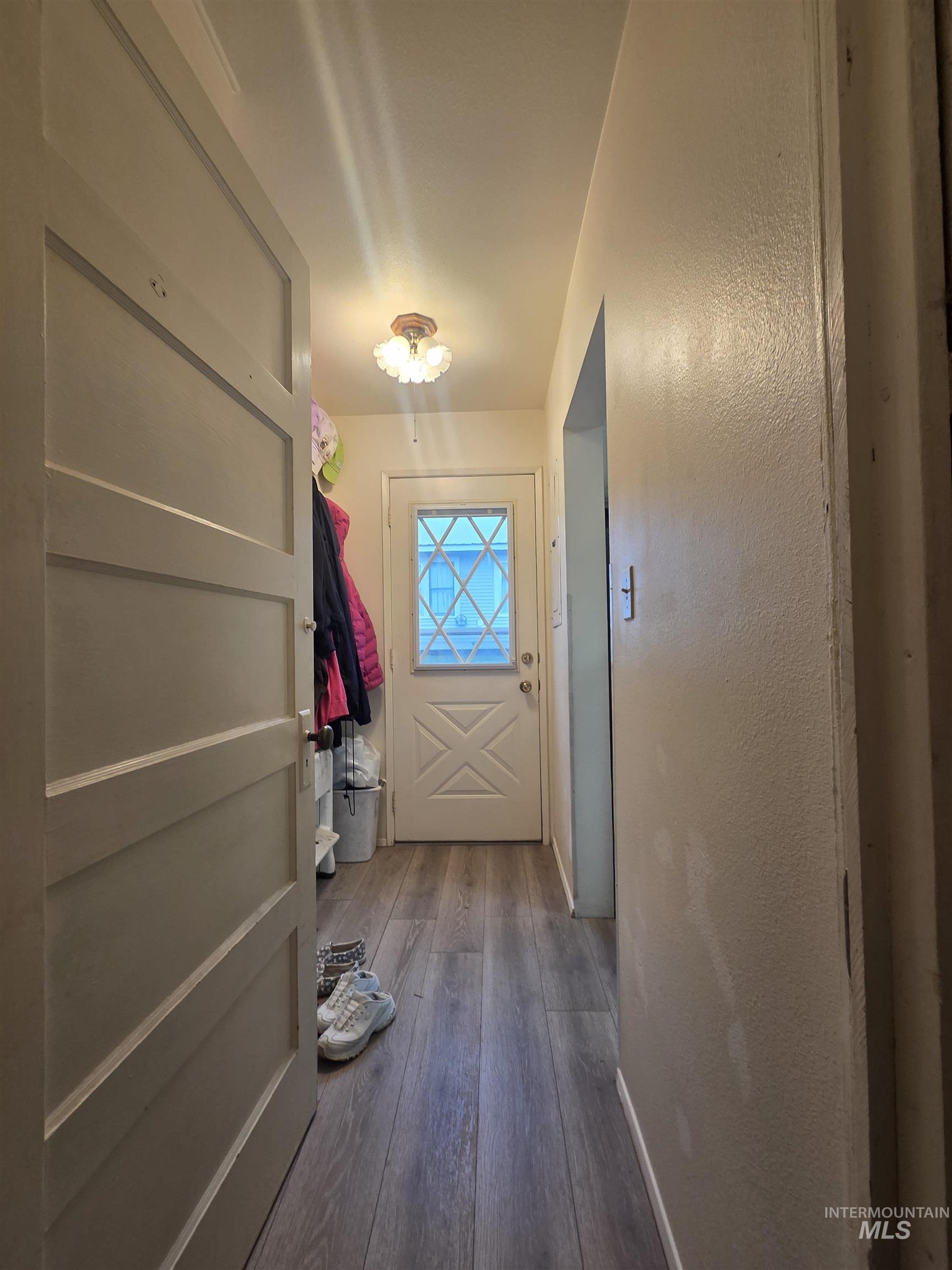 1607 Main Street Pomeroy, WA 99347 - Photo 20 of 28 Entryway with wood-type flooring and a textured wall