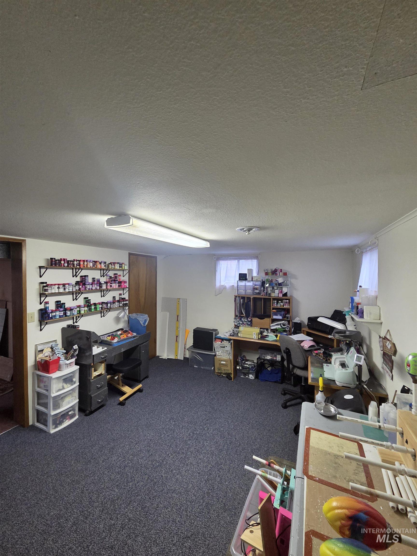 1607 Main Street Pomeroy, WA 99347 - Photo 24 of 28 Home office featuring a textured ceiling