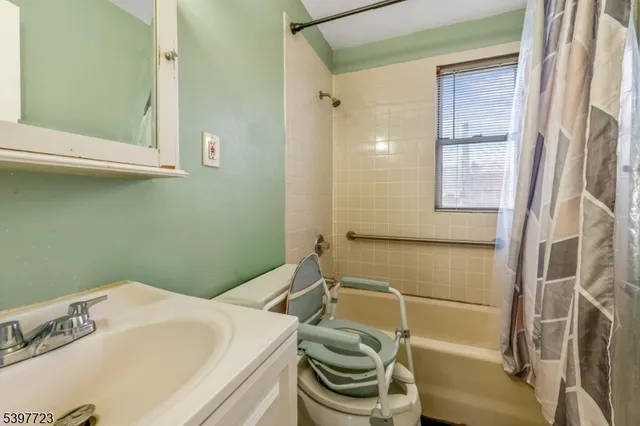 a bathroom with a sink and a shower