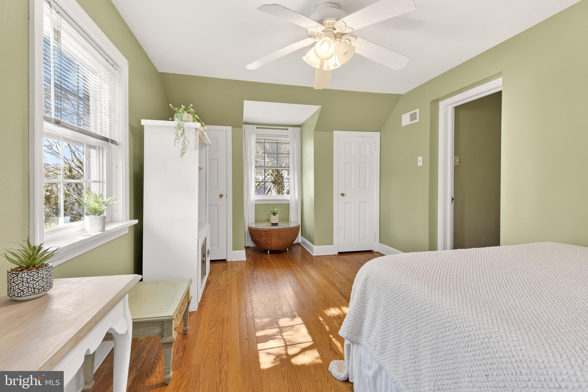2315 Edgewood Road Harrisburg, PA 17104 - Photo 27 of 41 a spacious bedroom with a bed and a chandelier