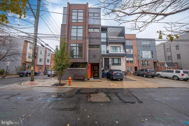 a view of a street with cars