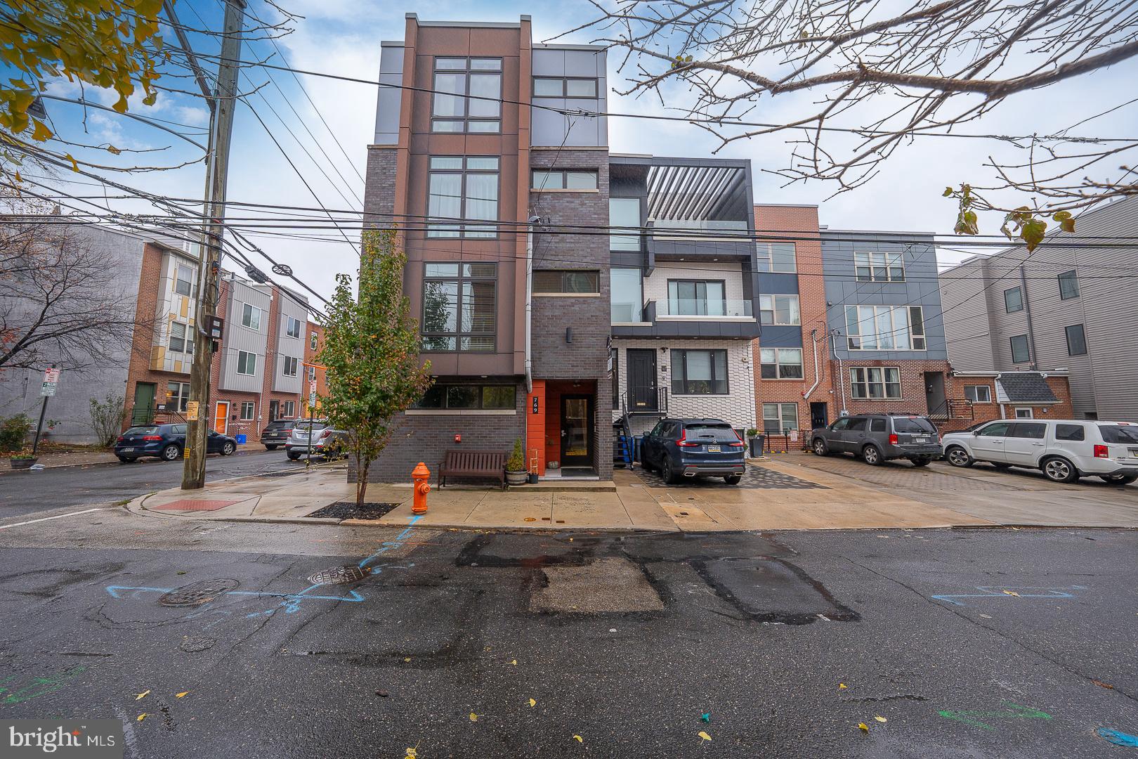 769 North Uber Street, Unit 2 Philadelphia, PA 19130 - Photo 1 of 23 a view of a street with cars