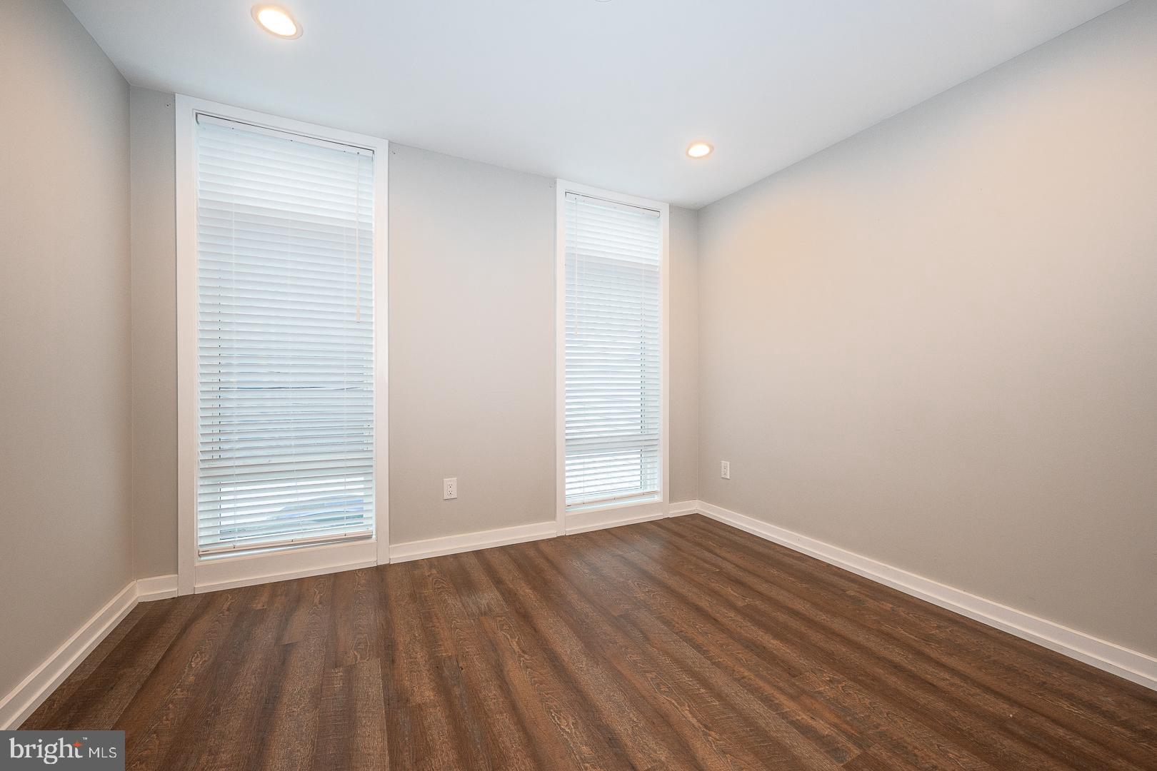 769 North Uber Street, Unit 2 Philadelphia, PA 19130 - Photo 14 of 23 a view of an empty room with wooden floor and closet