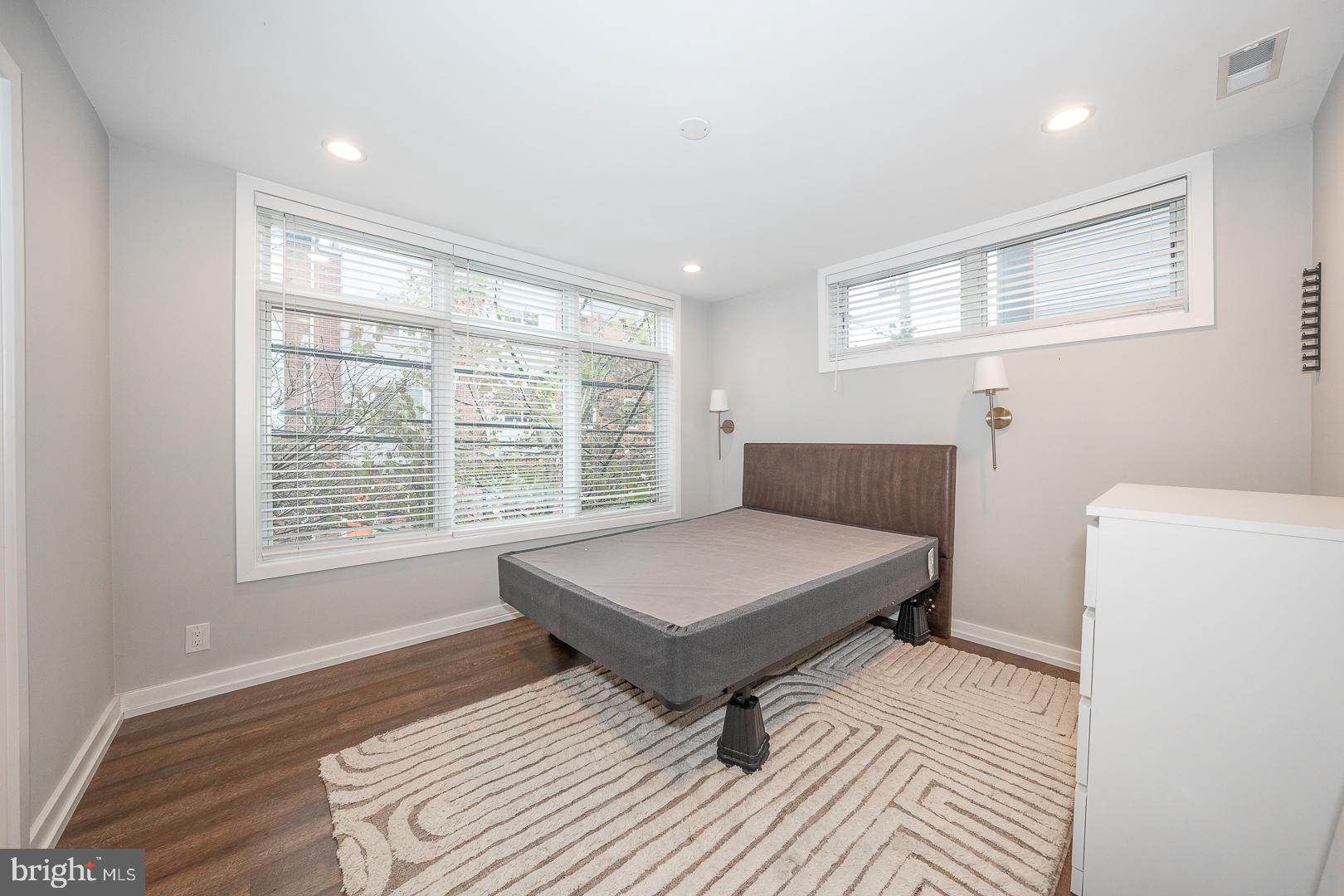 769 North Uber Street, Unit 2 Philadelphia, PA 19130 - Photo 16 of 23 a bedroom with a bed and a window