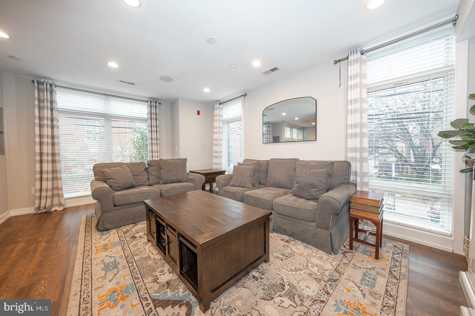 769 North Uber Street, Unit 2 Philadelphia, PA 19130 - Photo 3 of 23 a living room with furniture and a window