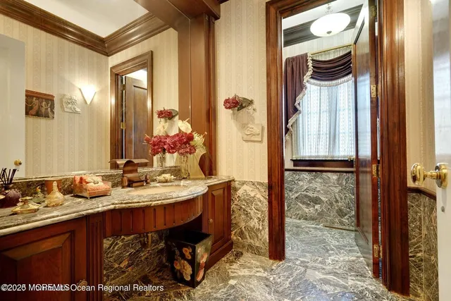 a living room with furniture rug and window