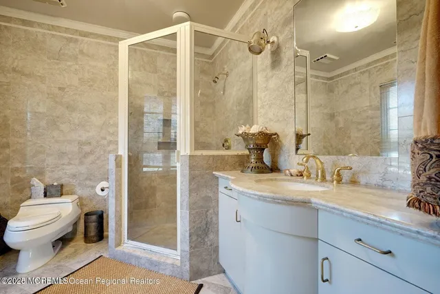 a view of a house with swimming pool and sitting area